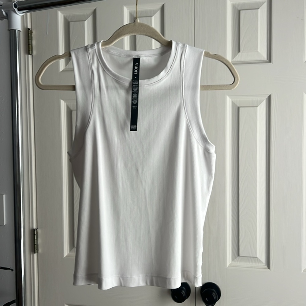 Never worn, Vuori Medium no sleeves shirt